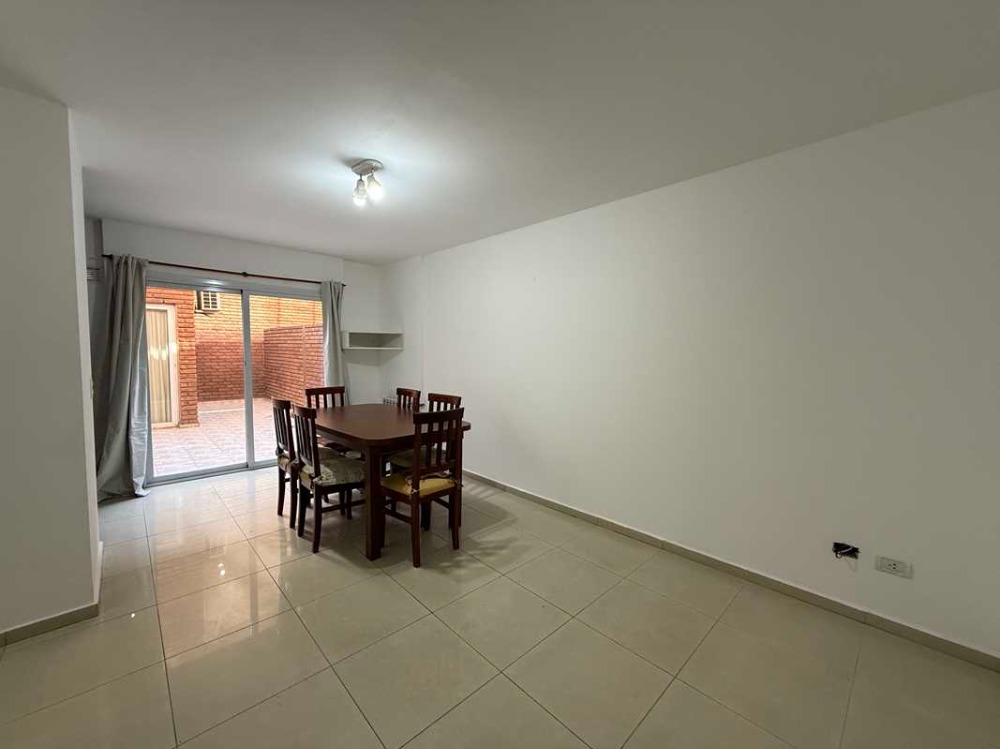 DEPARTAMENTO DE UN DORMITORIO CON COCHERA Y PATIO PROPIO - EDIFICIO TORRE SERENA