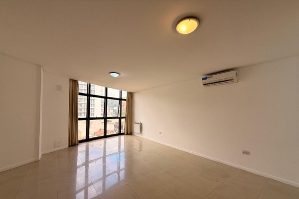 DEPARTAMENTO DOS DORMITORIOS CON COCHERA - EDIFICIO MELOS