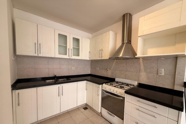 DEPARTAMENTO DOS DORMITORIOS CON COCHERA - EDIFICIO MELOS