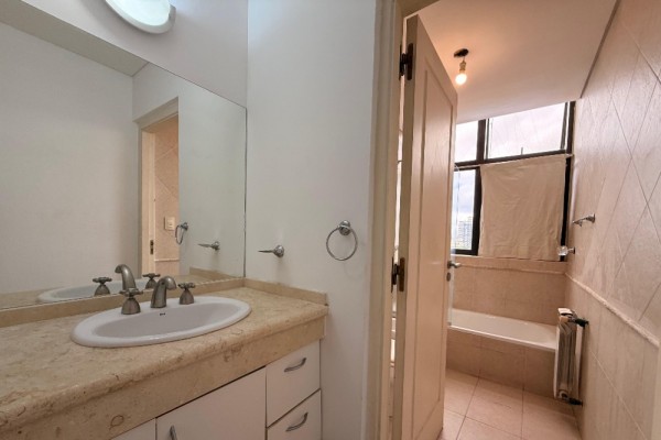 DEPARTAMENTO DOS DORMITORIOS CON COCHERA - EDIFICIO MELOS